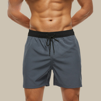 Badehose für Herren - Leichte, schnelltrocknende Badeshorts mit Stretch für den Sommer – Grau schwarz