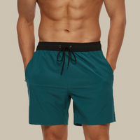 Badehose für Herren - Leichte, schnelltrocknende Badeshorts mit Stretch für den Sommer – Türkis schwarz
