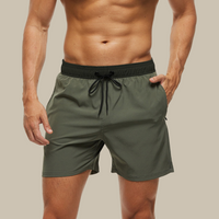 Badehose für Herren - Leichte, schnelltrocknende Badeshorts mit Stretch für den Sommer – Armee grün schwarz