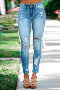 Melany | Zerrissene Skinny Jeans mit rohem Saum – Blau