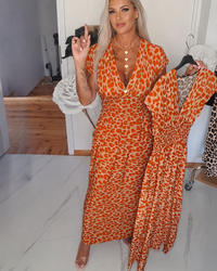 Dyshelle - Stilvolles Boho-Kleid mit V-Ausschnitt – Orange