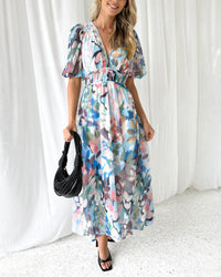 Heidi-Mode | Elegantes Kleid mit Blumendruck und V-Ausschnitt – Blau