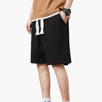 Herren Shorts knie­lang mit Seitentaschen für den Sommer – Schwarz