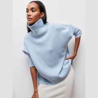 Kurzarm-Rollkragenpullover – Kühne Eleganz mit modernem Flair – Blau
