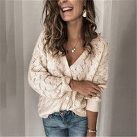 Damen Strickjacke mit zauberhaftem Lochmuster und lässigem Schnitt – Aprikose