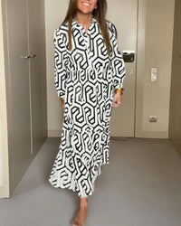 Kleid mit neun Punkten und geometrischem Print – Schwarz