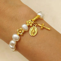 Ninetta – Serenity Jungfrau Maria Gänseblümchen-Armband – Gold