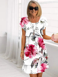Gilla – Blumenkleid mit fließendem Design Multi Pflanze – Weiß