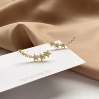 Yazaria – Ohrringe mit Blumenmuster – Gold