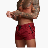 Herren Badeshorts mit Kordelzug und Seitentaschen mit Reißverschluss – Weinrot