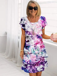 Gilla – Blumenkleid mit fließendem Design Multi Pflanze – Flieder