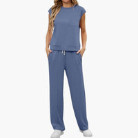 Zweiteiliges Sommer Set für Damen mit Kappärmeln und Taschen – Blau