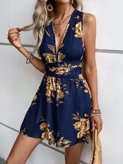 Emma | Jumpsuit mit tiefem V-Ausschnitt und Blumenmuster zum Binden für Frauen – Tiefblau