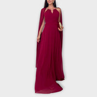 Mabel - Elegantes Maxikleid mit Cape-Ärmeln und hohem Schlitz" 

Rewritten: "Mabel - Stilvolles Maxikleid mit schwingenden Cape-Ärmeln und verführerischem Schlitz – Rot