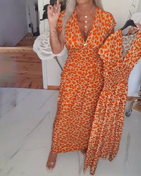 Benara - Printkleid mit V-Ausschnitt – Orange