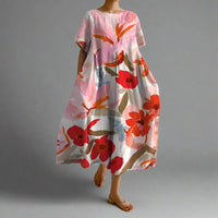 Xyrhilda | Sommerkleid mit Blumenmuster und Fließendem Schnitt – Rosa