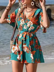 Penelope - Romper mit Blumenmuster und Wickelausschnitt – Mehrfarbig