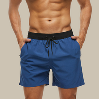 Badehose für Herren - Leichte, schnelltrocknende Badeshorts mit Stretch für den Sommer – Hellblau schwarz