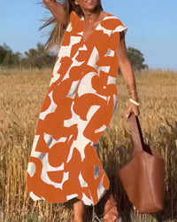 Miriam | Bedrucktes Maxikleid mit V-Ausschnitt – Orange
