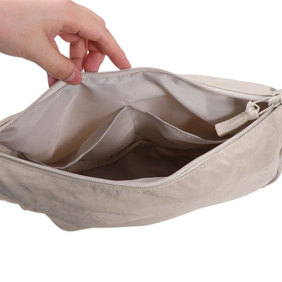 ArcSling - Halbmondförmige Crossbody-Tasche