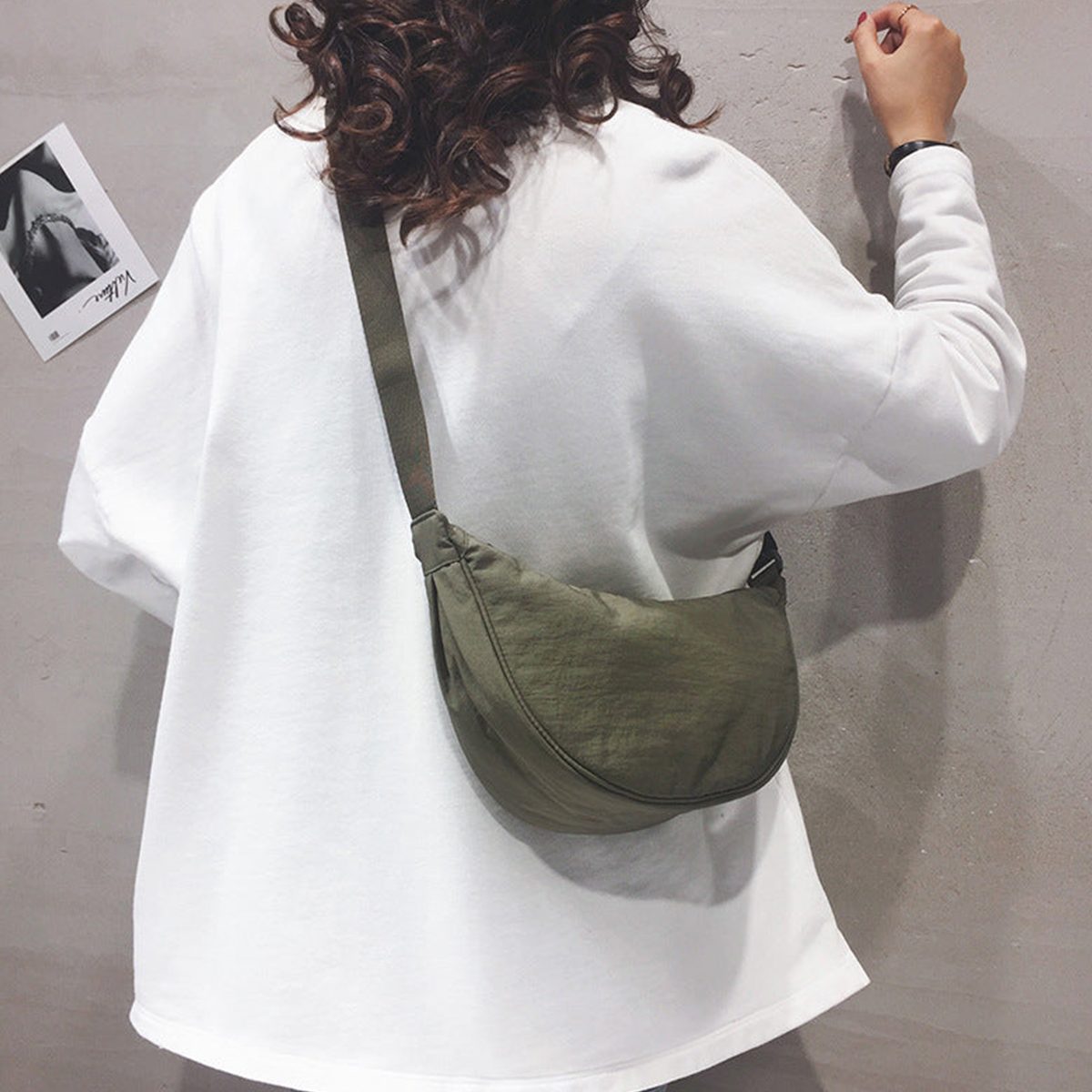 ArcSling - Halbmondförmige Crossbody-Tasche