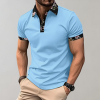 Poloshirt für Herren - Polo mit tropischem Print für den Sommer 2024 – Himmelblau