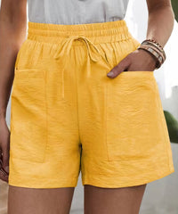 Lotta | Luftige Paperbag-Shorts – Gelb
