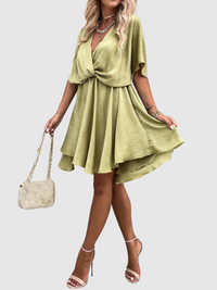 Laris – Kurzkleid aus Seide im Cross-Design – Hellgrün