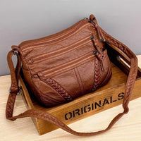 Elegante Damenhandtasche aus funktionalem, weichem Material – Braun