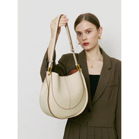 Elegante, runde Damen-Schultertasche aus Leder – Weiß