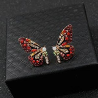 Schmetterlingsohrringe Limited Edition mit Zirkonia-Inlay – Rot