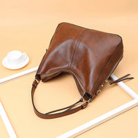 Romy | Elegante Ledertasche – Braun