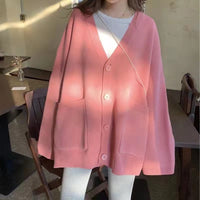 Übergroßer Damen Pullover mit V-Ausschnitt und Knopfleiste - Lässiger Strick – Rosa