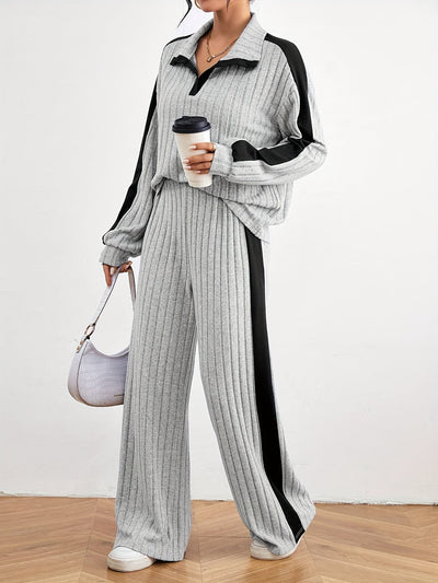 Bequemes Damen-Outfit: Schulterfreier Pullover mit weiter Jogginghose für den Winter