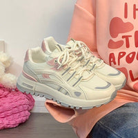 Damen Sportliche Sneakers mit charakteristischer Profilsohle und atmungsaktivem Mesh-Obermaterial – Rosa