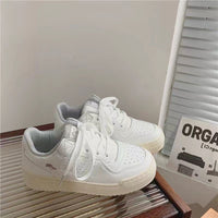 Damen Sportliche Sneakers mit floralem Design – Reinweiß
