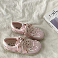 Damen Sneaker mit atmungsaktivem Obermaterial und stylishen Akzenten – Rosarot