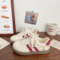 Damen Sneakers im verspielten Design mit Hello Kitty-Applikationen – Rosa