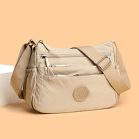 Cilka – Umhängetasche Mit Reißverschluss Und Taschen – Beige