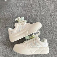 Damen Sneakers mit elegantem Rüschen-Design und gepolsterter Sohle – Cremeweiß