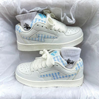 Damen Sneakers mit karierter Applikation und bequemer Dämpfung – Weißblau
