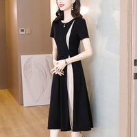 Hanne - Schwarz-weißes Midikleid – Aprikose