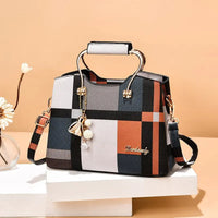 Praktische Damen-Schultertasche mit verstellbaren Trägern aus hochwertigem Kunstmaterial – Schwarzes Quadrat Orange