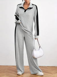 Bequemes Damen-Outfit: Schulterfreier Pullover mit weiter Jogginghose für den Winter – Grau