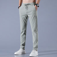 Alex Stretchhose | Atmungsaktive Sommer-Laufhose mit Taschen – Grün