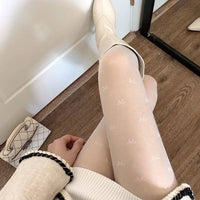 Oberschenkelhohe-Strumpfhose für Damen | Mit Gemustertem Design – Weißer Schmetterling