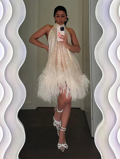 Joy - Glitzerndes Minikleid mit Federn