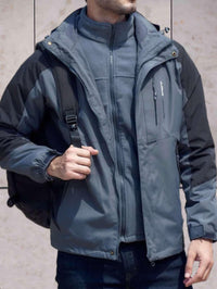 Wind- und wasserdichte Wanderjacke mit Kapuze, Taschen und doppeltem Reißverschluss und Knopfverschluss – Grau