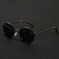 Mette | Zeitlose Runde Sonnenbrille – Orange / Schwarz