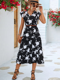 Sana | Elegantes Sommerkleid mit Druck – Schwarz